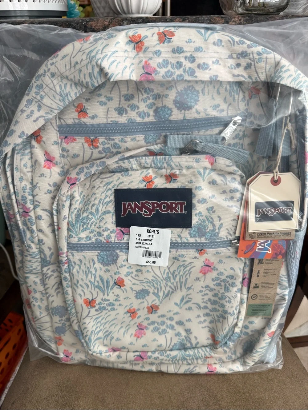 JanSport Floral Butterfly Backpack in Cream and Blue